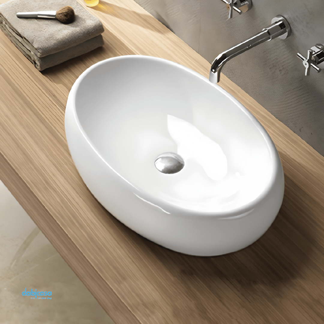 Lavabo D'Appoggio Ovale "Break The Rules" In Ceramica Da 60 Cm Finitura Bianco Lucido - Dabicasa